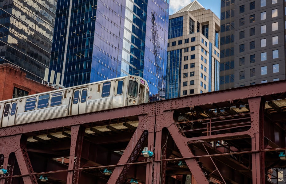 Chicago elevated train and downtown buildings during Twin Bridge's early growth and launch of PSF II.